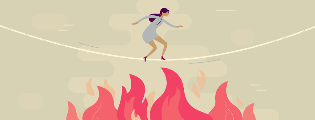 Woman walking balancing on tightrope over flames fire